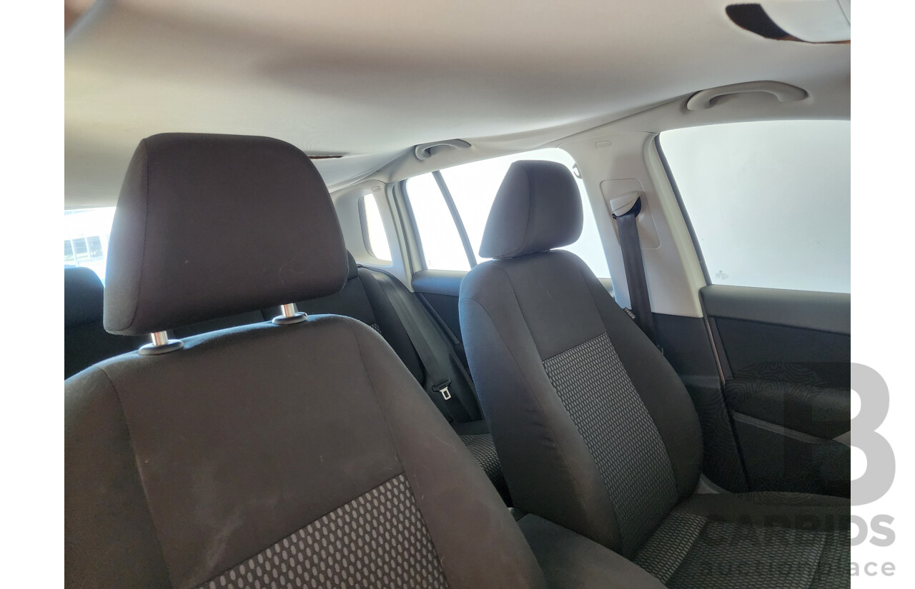 7/2009 Volkswagen Tiguan 125 TSI 5NC MY09 4d Wagon White 2.0L