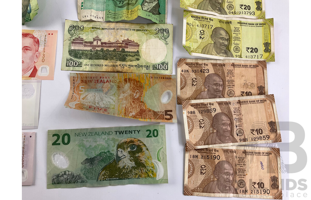 Collection of International Banknotes Including India, Bangaldesh, New Zealand, Singapore, Bhutan, Brunei, Australia