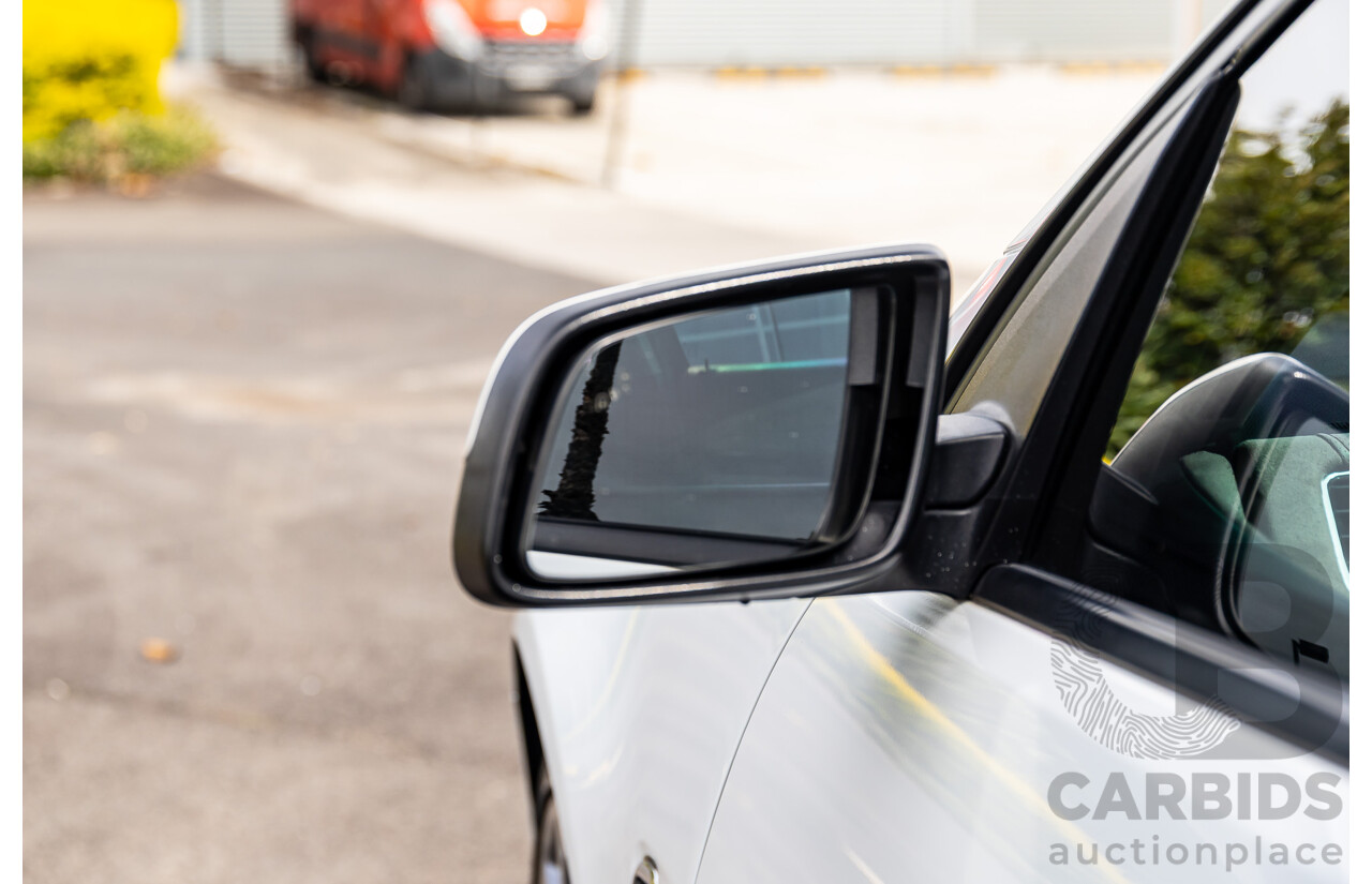 6/2014 Holden VF Commodore SS-V 2d Utility Heron White V8 6.0L - Supercharged