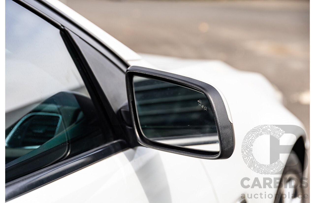 6/2014 Holden VF Commodore SS-V 2d Utility Heron White V8 6.0L - Supercharged