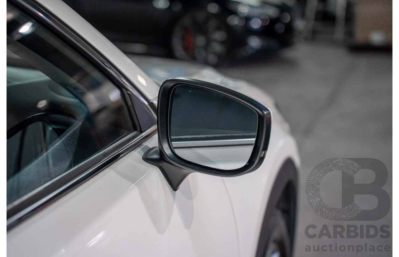 01/2018 Mazda CX-9 Sport (FWD) MY18 4D Wagon Snowflake White Pearl Turbo 2.5L - 7 Seater