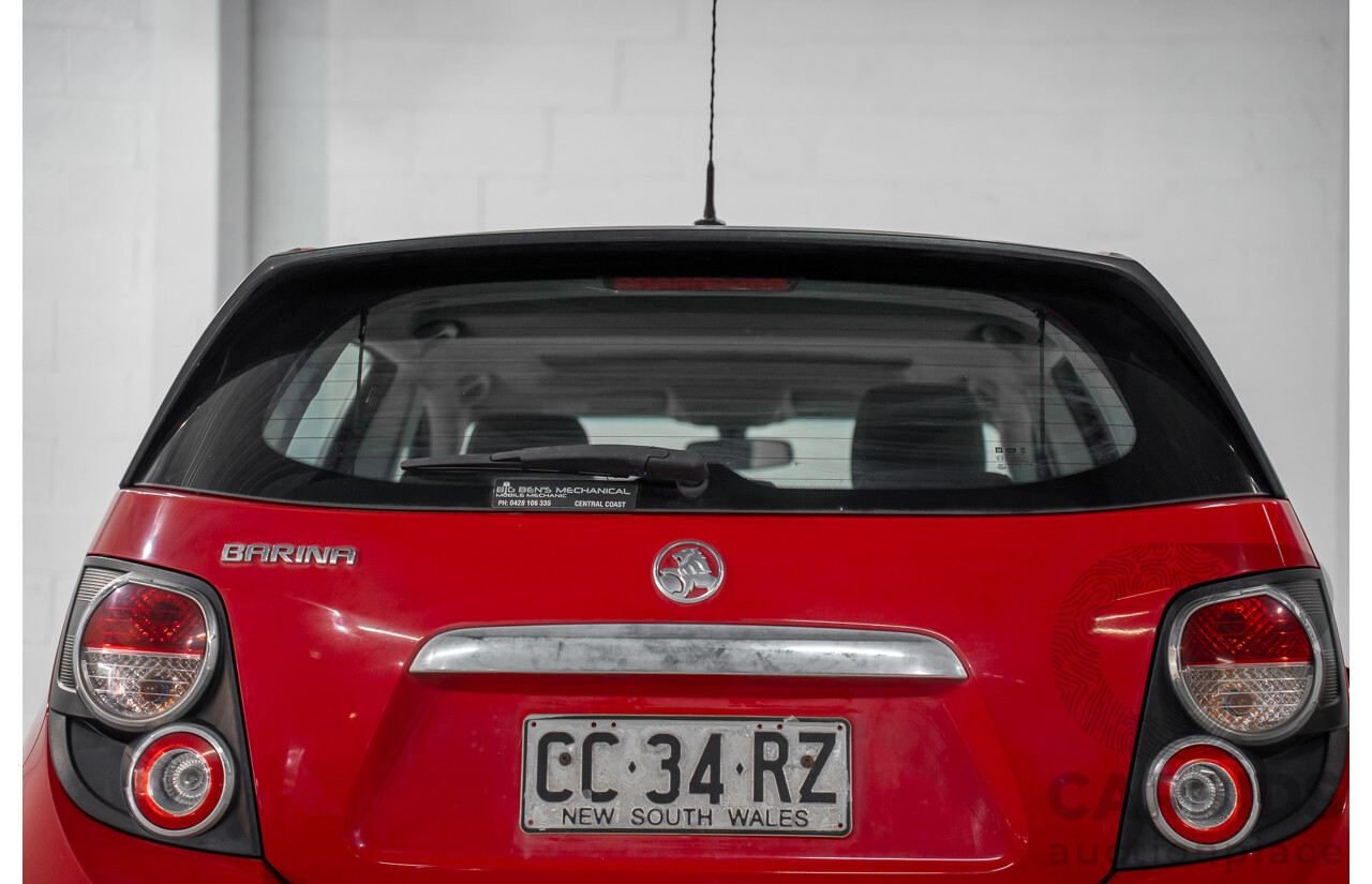 4/2015 Holden Barina X TM MY15 5d Hatchback Blaze Red 1.6L