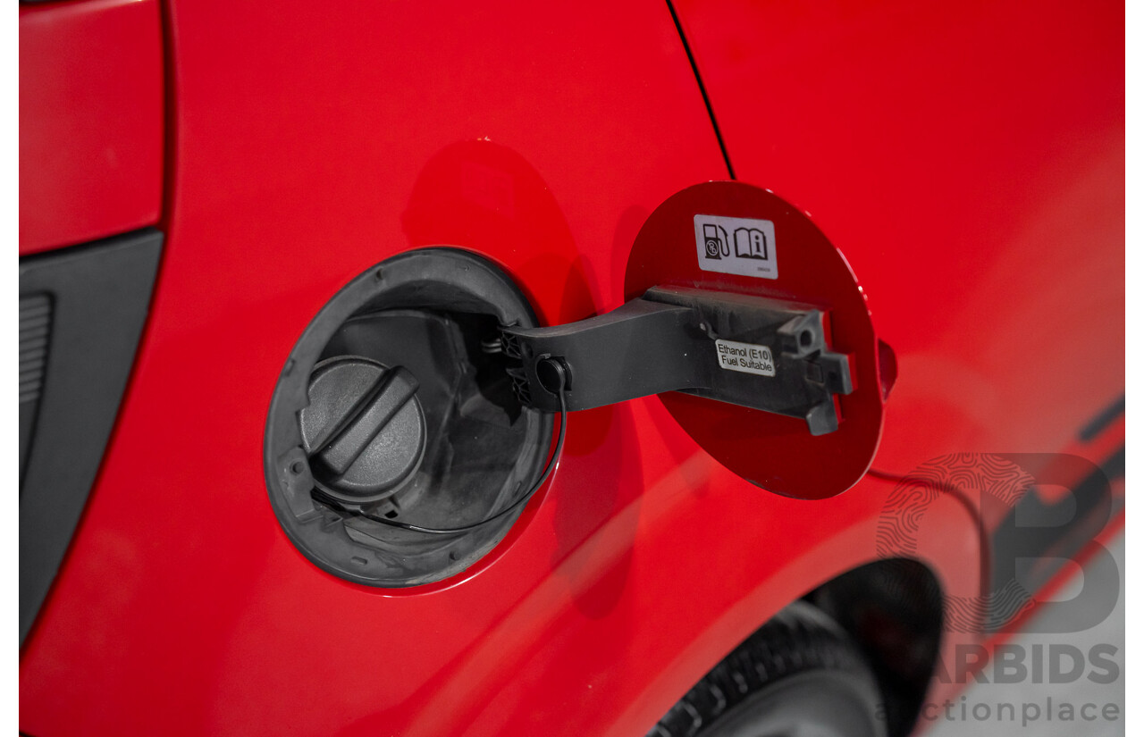 4/2015 Holden Barina X TM MY15 5d Hatchback Blaze Red 1.6L