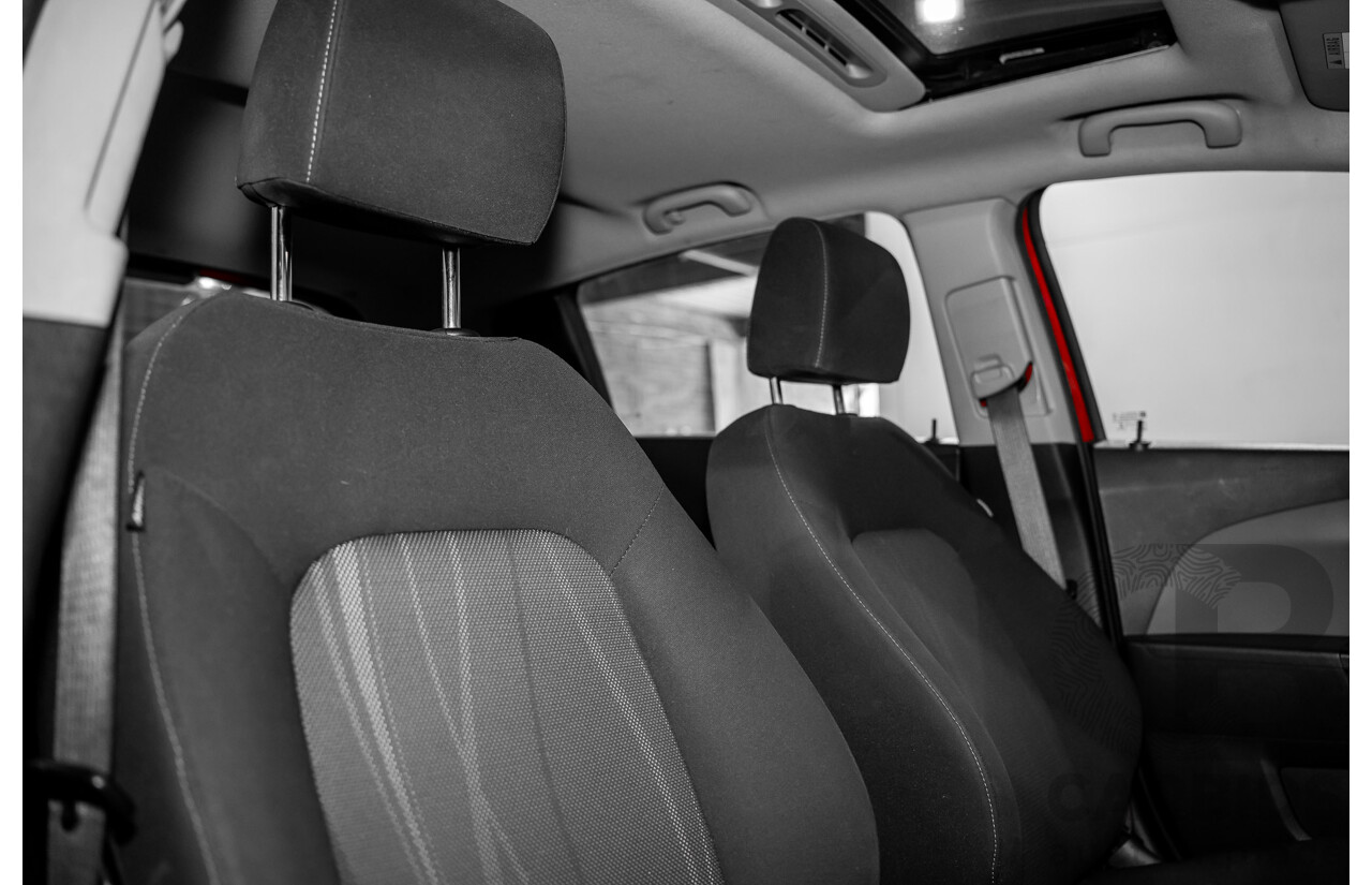 4/2015 Holden Barina X TM MY15 5d Hatchback Blaze Red 1.6L