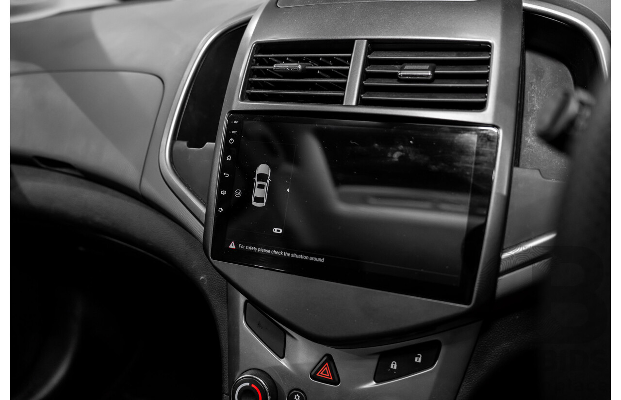 4/2015 Holden Barina X TM MY15 5d Hatchback Blaze Red 1.6L