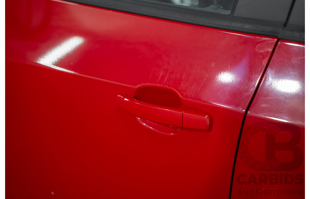 4/2015 Holden Barina X TM MY15 5d Hatchback Blaze Red 1.6L