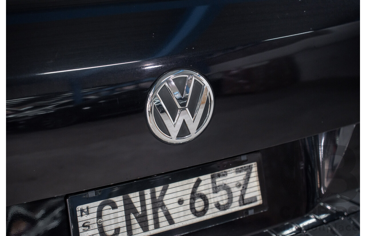 8/2012 Volkswagen Touareg V6 TDI 4xmotion 7P MY12 4d Wagon Deep Black Pearl Turbo Diesel V6 3.0L