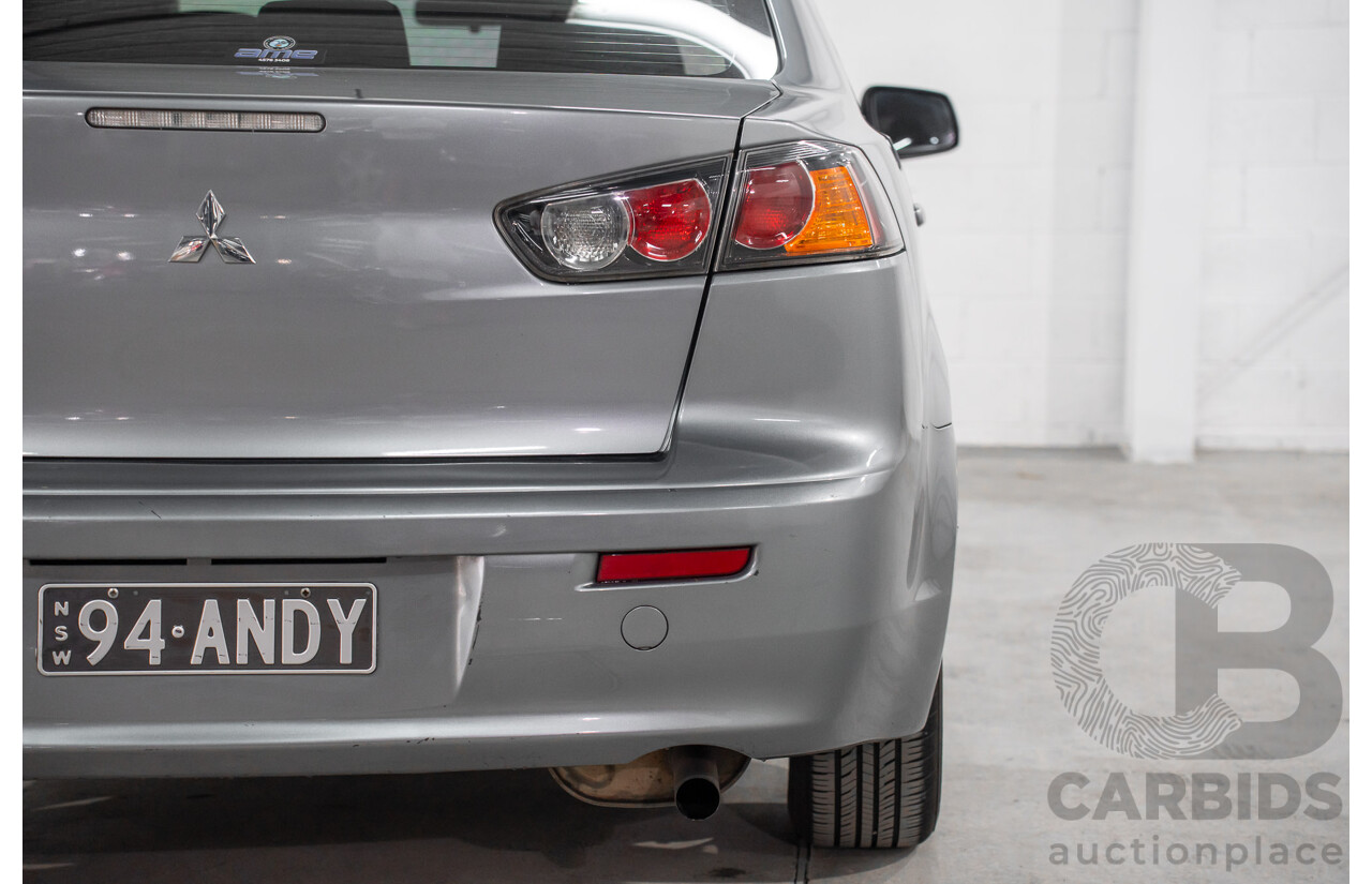 3/2014 Mitsubishi Lancer ES Sport CJ MY14.5 4d Sedan Warm Silver Metallic 2.0L