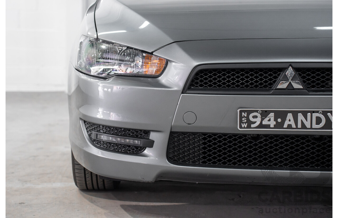 3/2014 Mitsubishi Lancer ES Sport CJ MY14.5 4d Sedan Warm Silver Metallic 2.0L