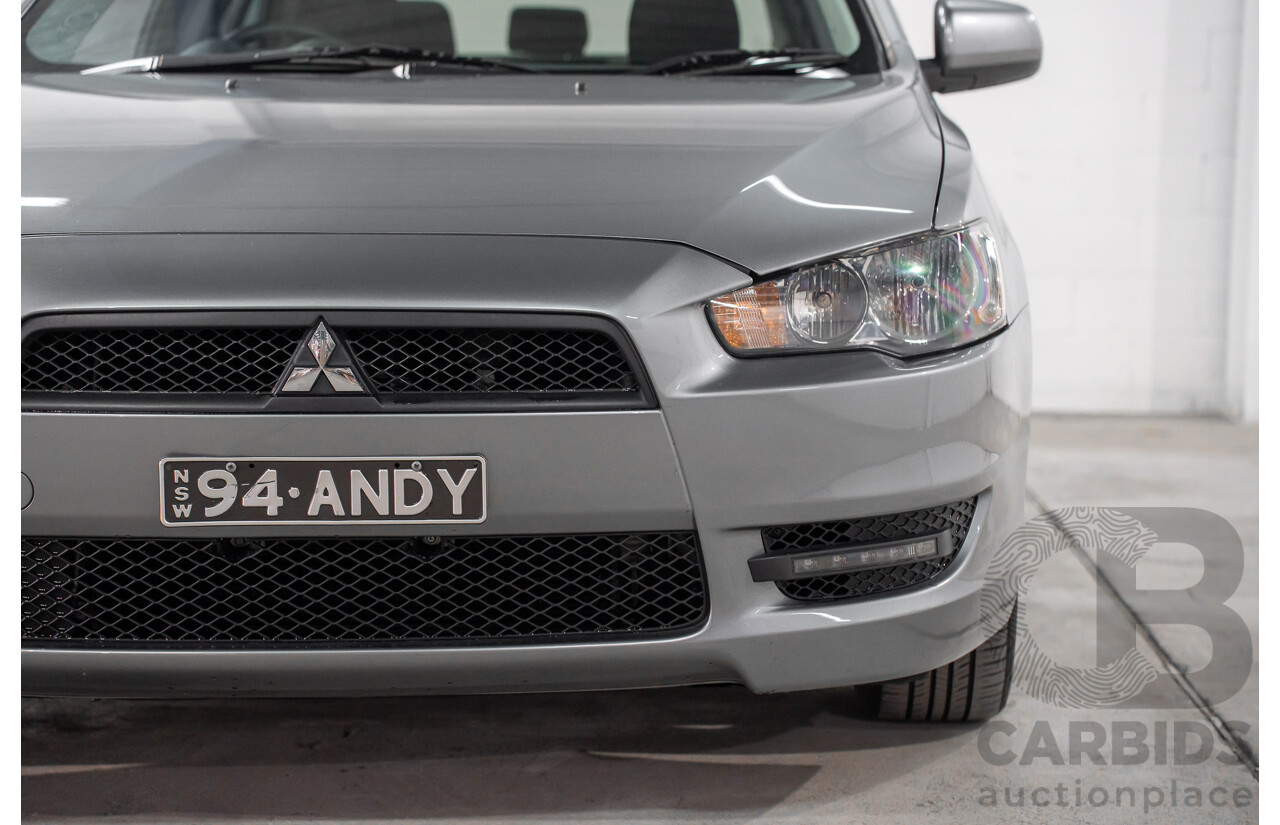 3/2014 Mitsubishi Lancer ES Sport CJ MY14.5 4d Sedan Warm Silver Metallic 2.0L