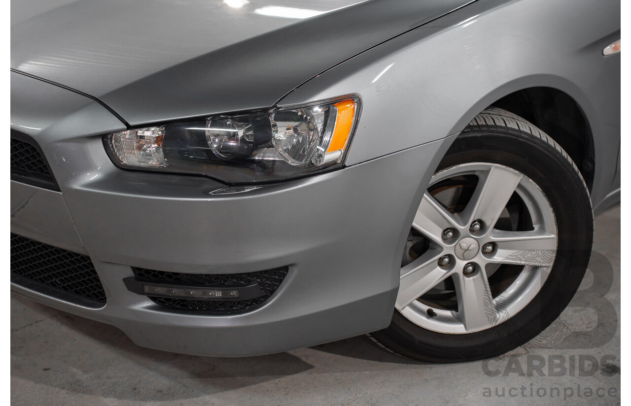 3/2014 Mitsubishi Lancer ES Sport CJ MY14.5 4d Sedan Warm Silver Metallic 2.0L