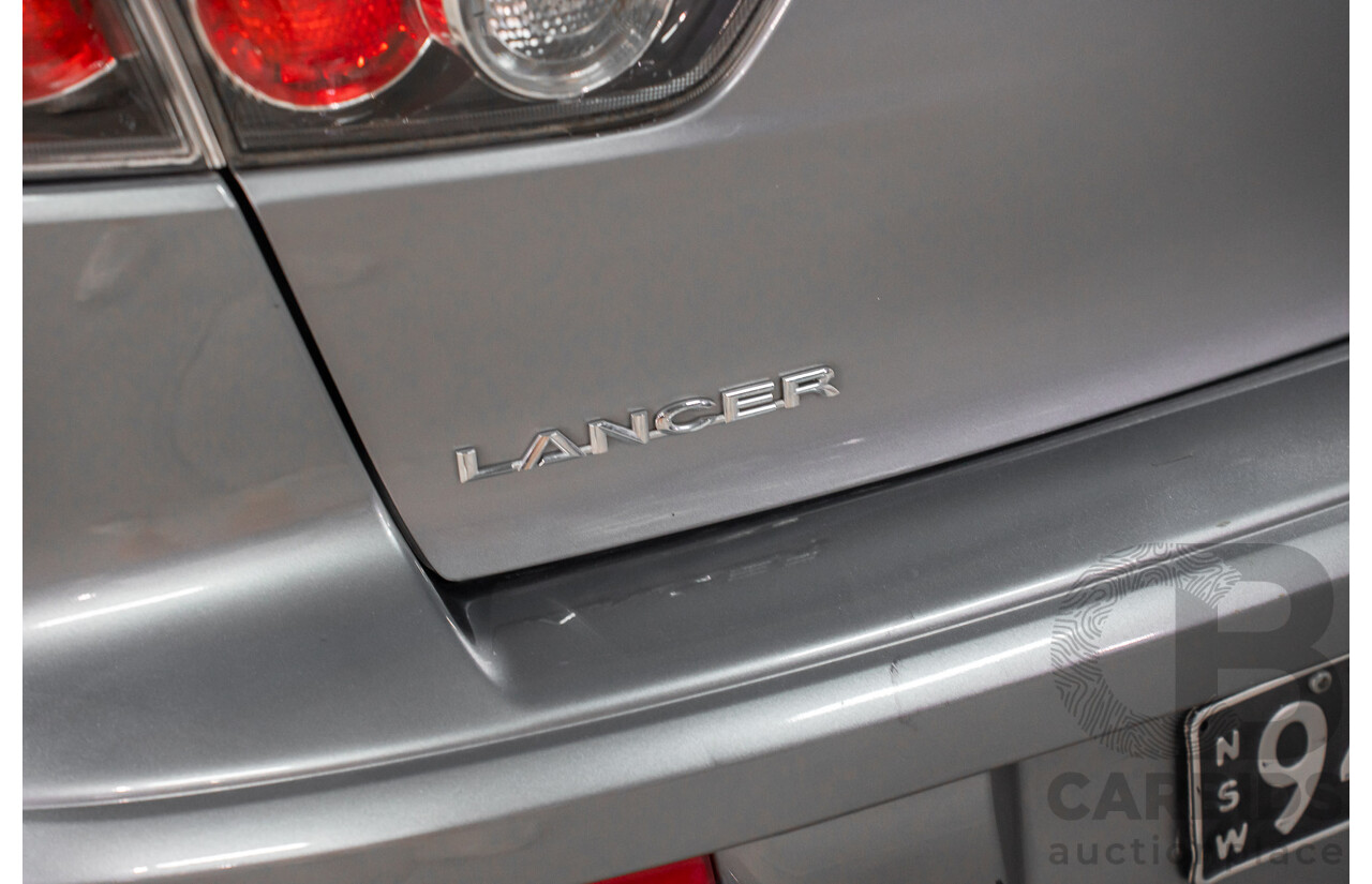 3/2014 Mitsubishi Lancer ES Sport CJ MY14.5 4d Sedan Warm Silver Metallic 2.0L