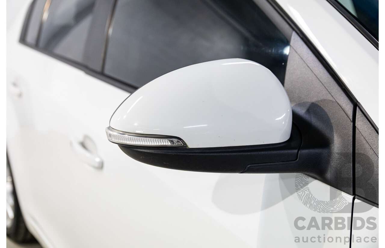 9/2015 Holden Cruze Equipe JH MY15 5d Hatchback White 1.8L