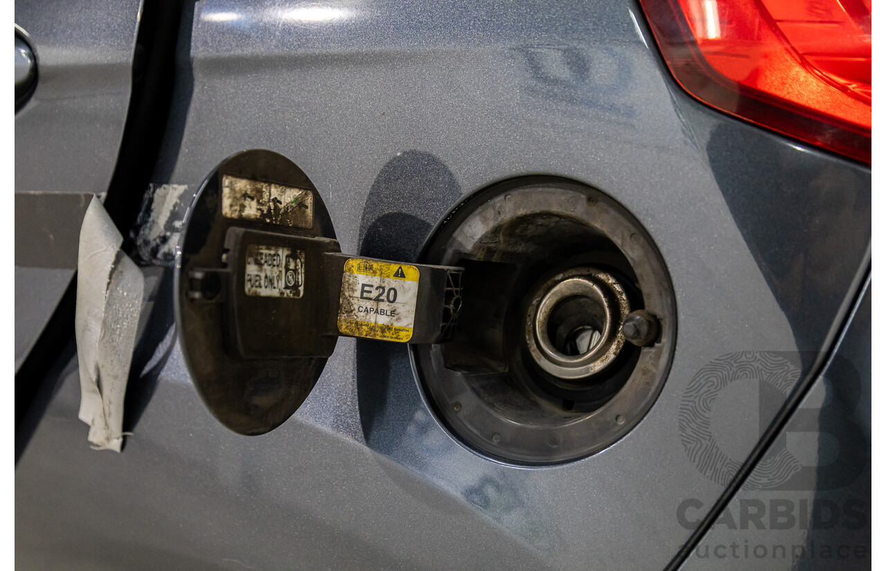 10/2010 Ford Fiesta LX WT 5d Hatchback Metropolitan Grey 1.6L