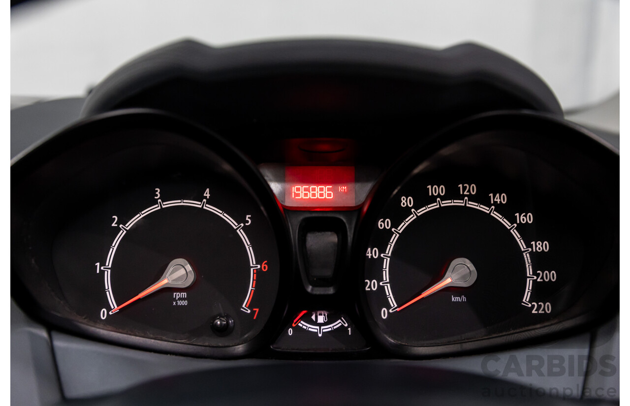 10/2010 Ford Fiesta LX WT 5d Hatchback Metropolitan Grey 1.6L