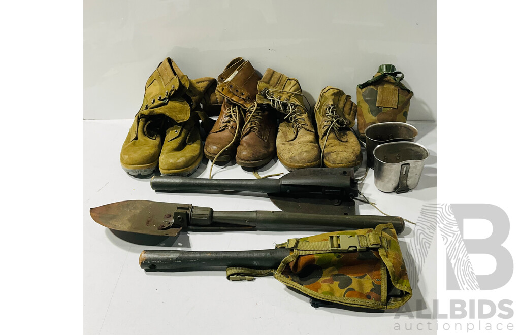 Collection of Military Gear Including Folding Shovels, Boots, Canteen and More