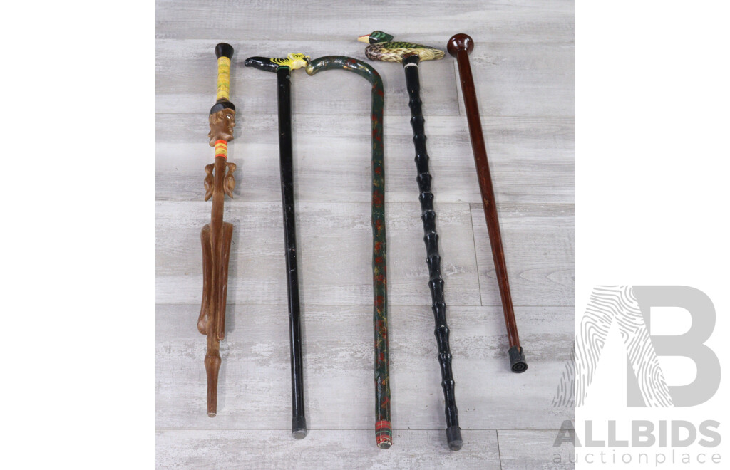 Plastic Floor Vase with Collection of Walking Sticks and Terracotta Vase