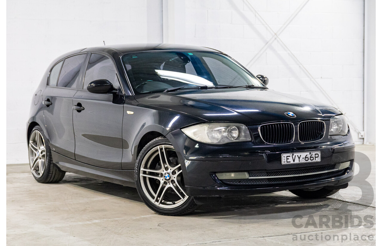 2/2009 BMW 120i E87 MY09 5d Hatchback Jet Black 2.0L