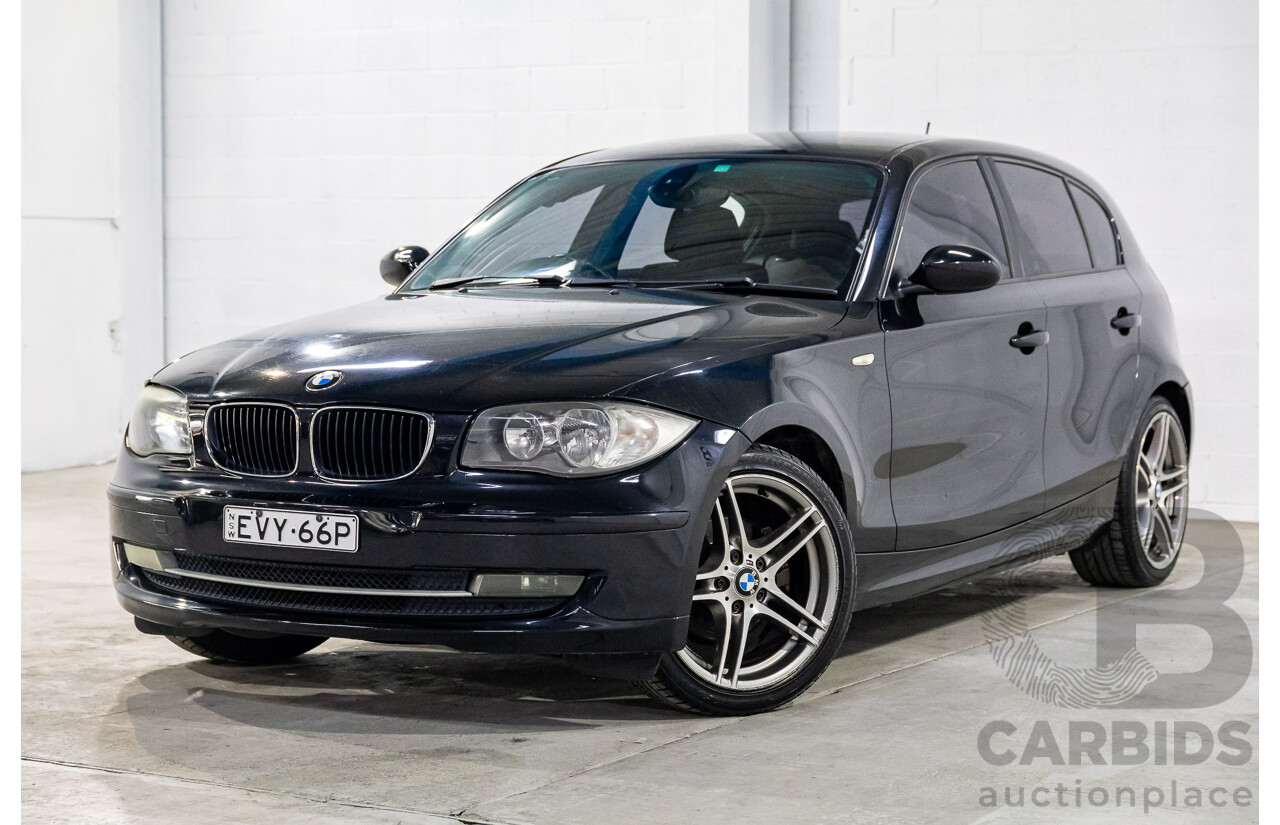2/2009 BMW 120i E87 MY09 5d Hatchback Jet Black 2.0L