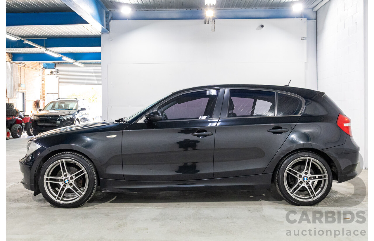 2/2009 BMW 120i E87 MY09 5d Hatchback Jet Black 2.0L
