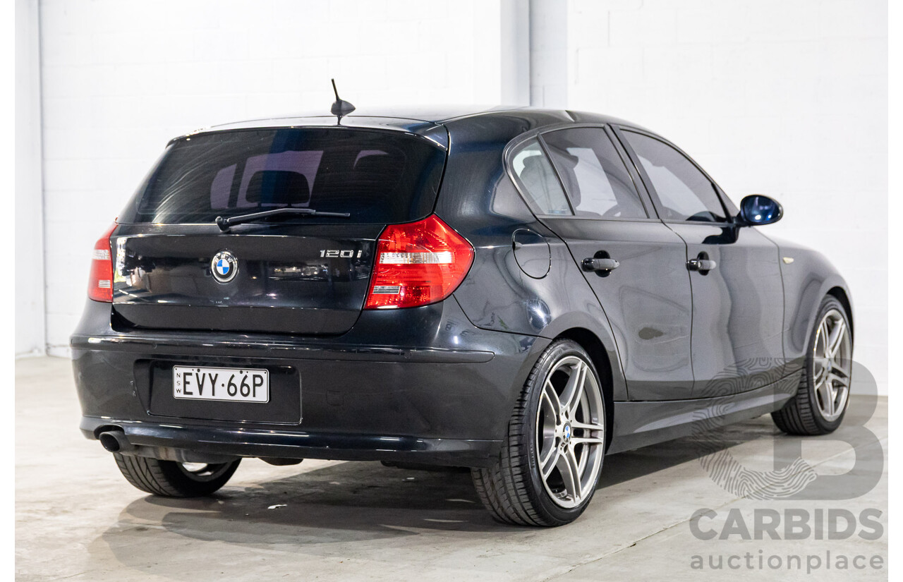 2/2009 BMW 120i E87 MY09 5d Hatchback Jet Black 2.0L