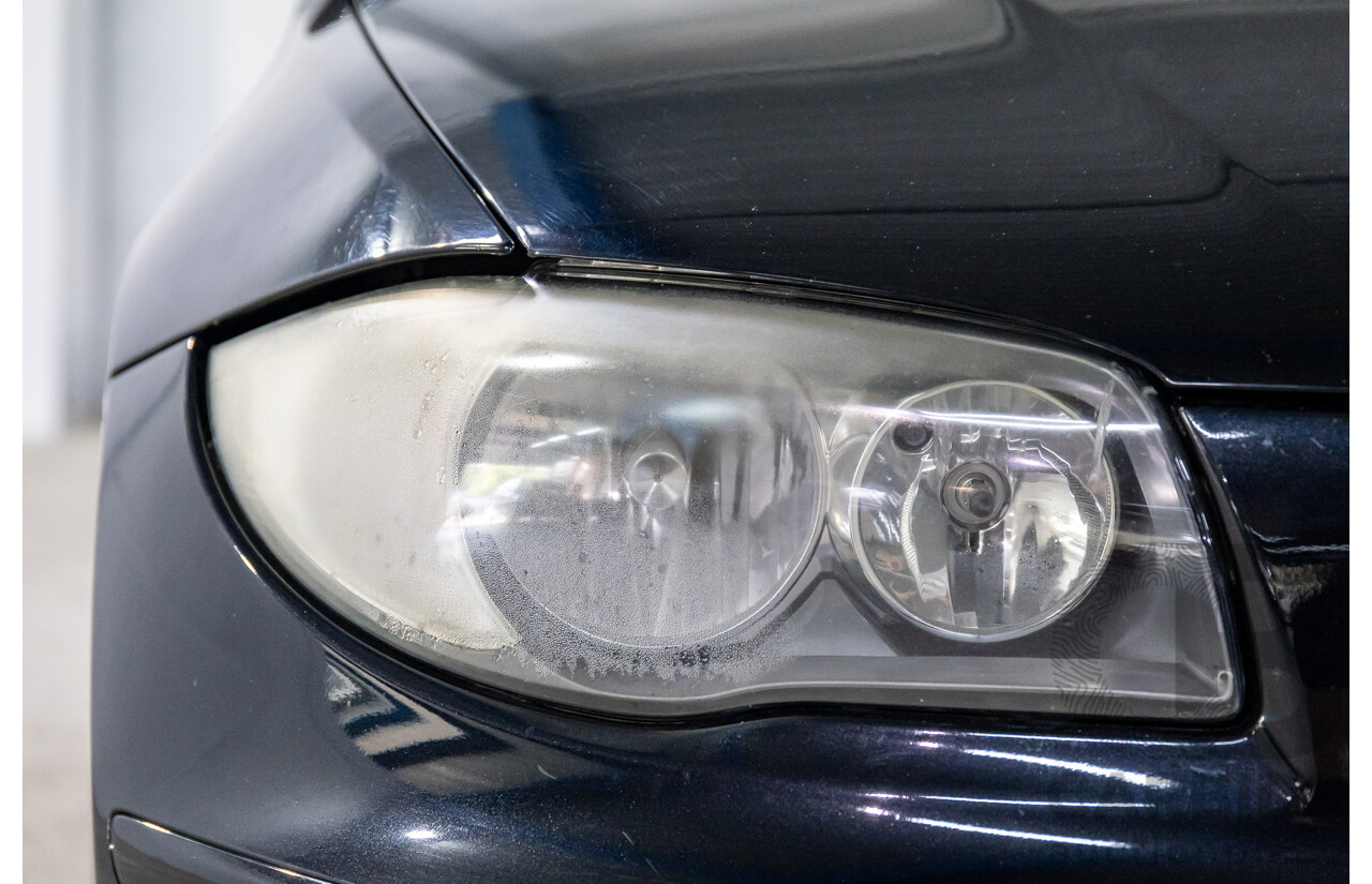 2/2009 BMW 120i E87 MY09 5d Hatchback Jet Black 2.0L