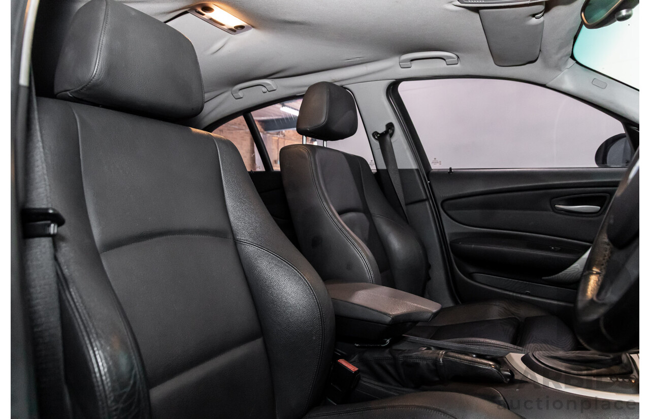 2/2009 BMW 120i E87 MY09 5d Hatchback Jet Black 2.0L