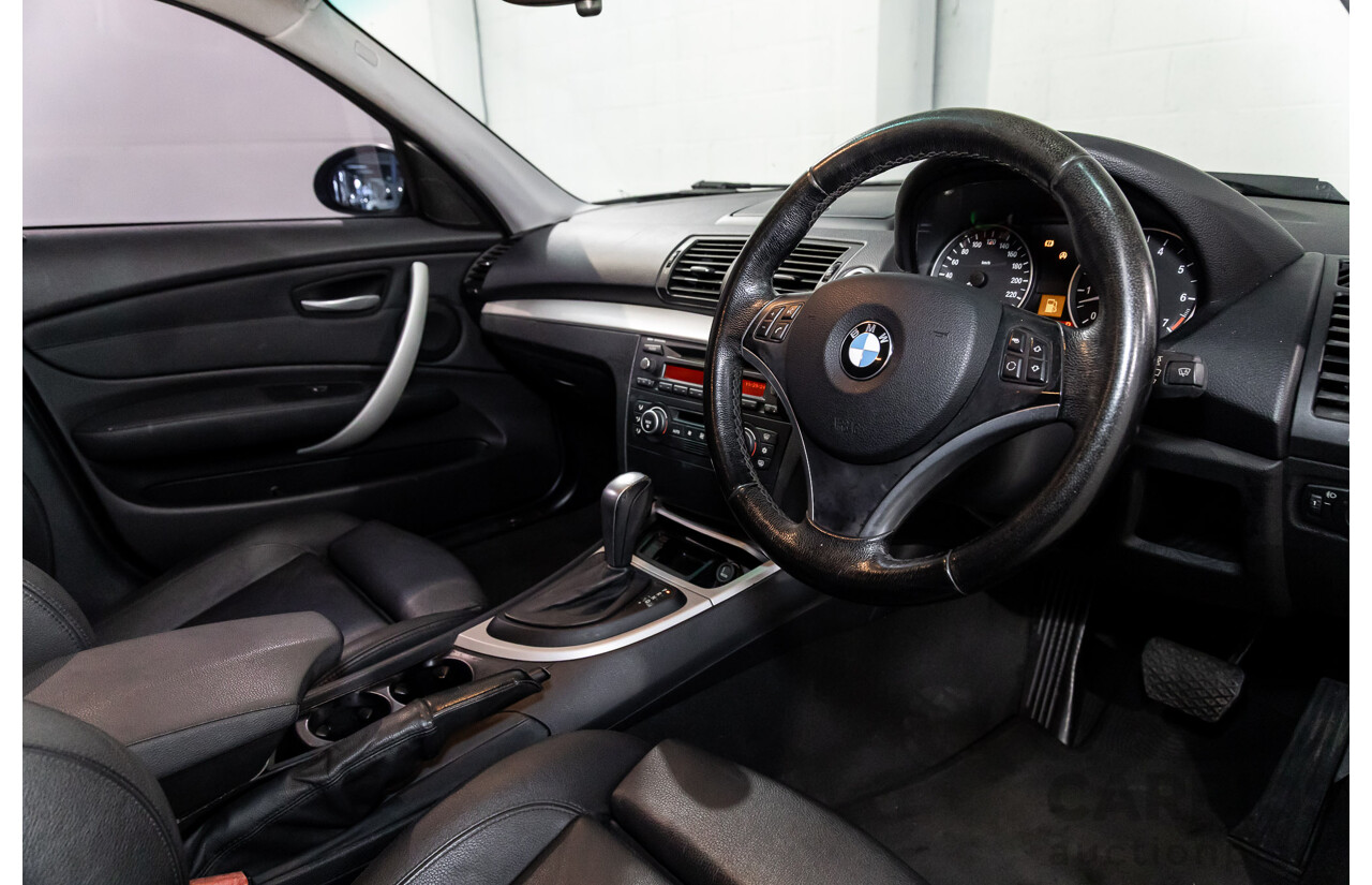 2/2009 BMW 120i E87 MY09 5d Hatchback Jet Black 2.0L