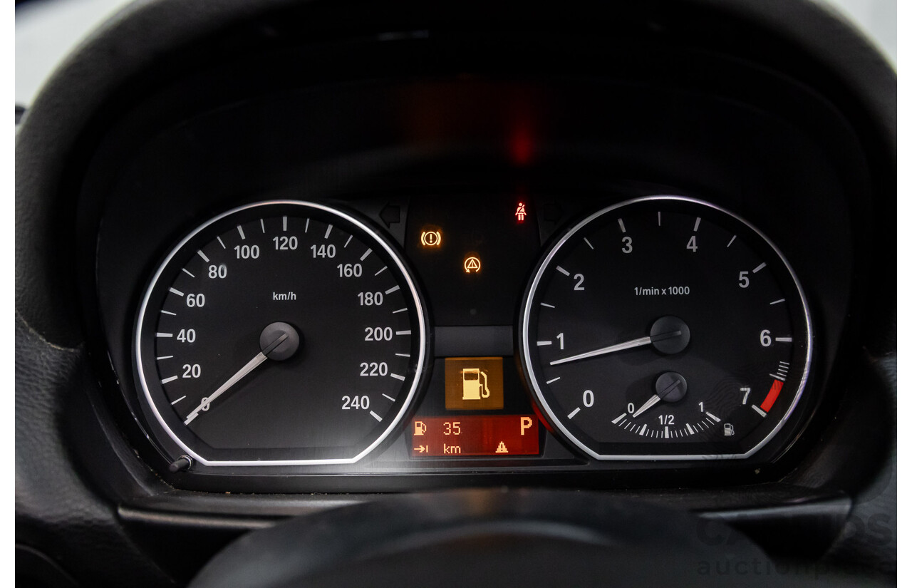 2/2009 BMW 120i E87 MY09 5d Hatchback Jet Black 2.0L