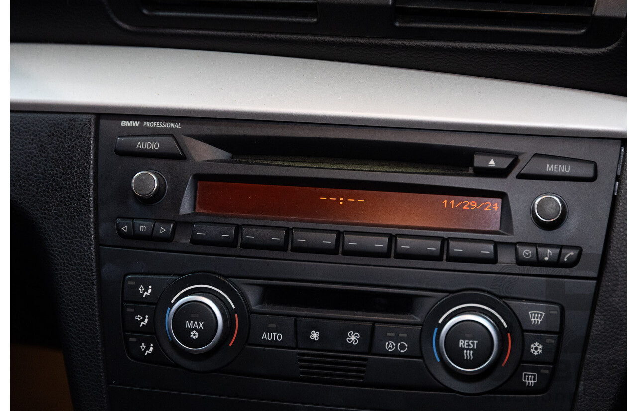 2/2009 BMW 120i E87 MY09 5d Hatchback Jet Black 2.0L