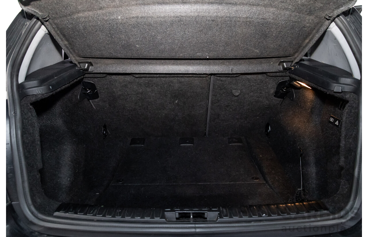 2/2009 BMW 120i E87 MY09 5d Hatchback Jet Black 2.0L