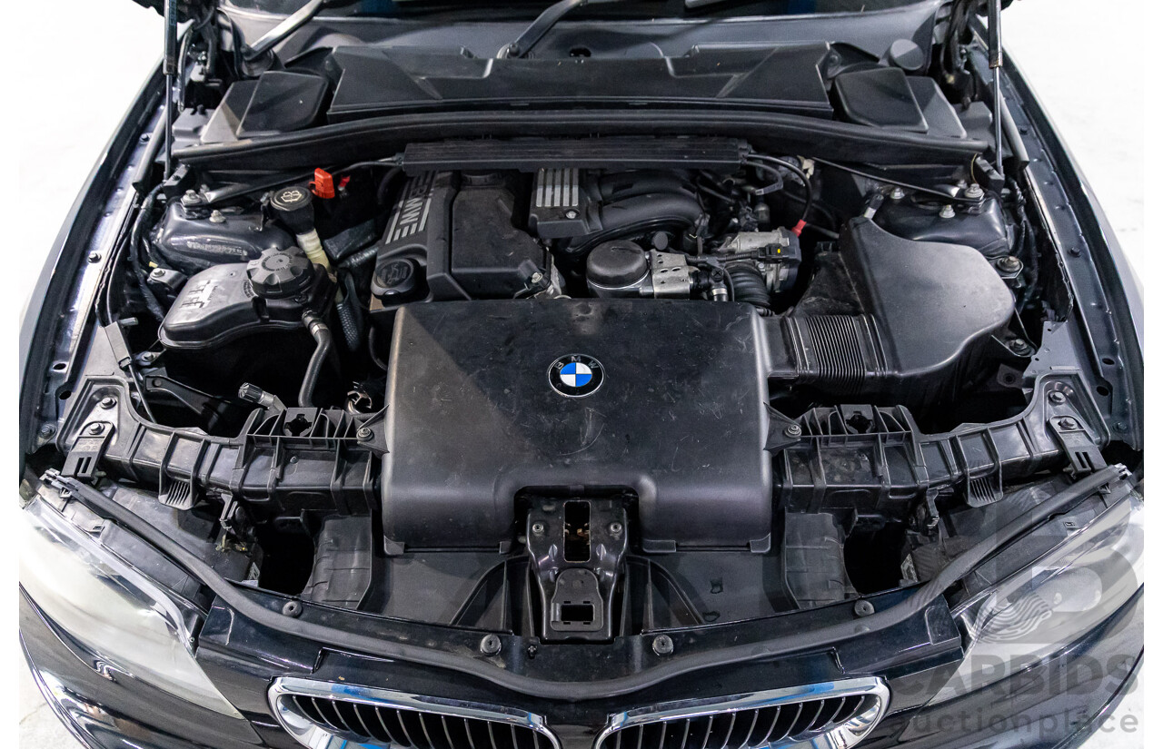 2/2009 BMW 120i E87 MY09 5d Hatchback Jet Black 2.0L