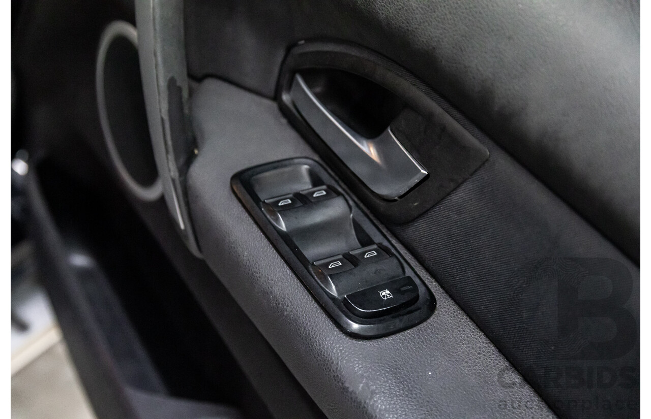 9/2015 Ford Territory TX (RWD) SZ MK2 4d Wagon Silhouette Black Metallic 4.0L - 7 Seater