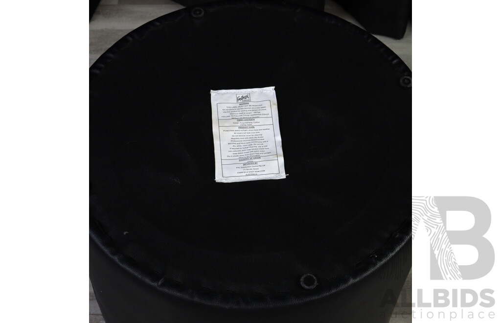Round Leatherette Ottoman