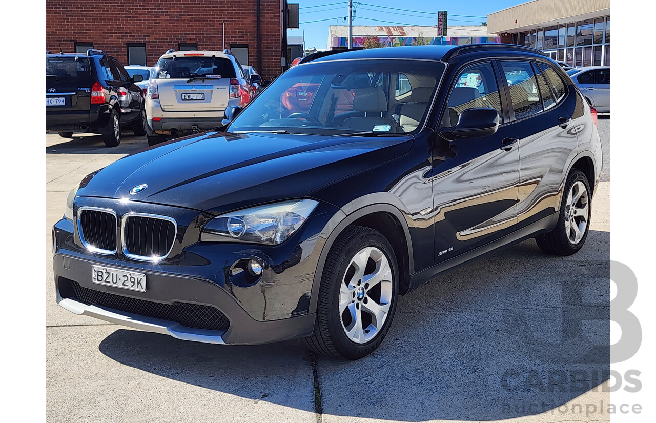 6/2011 Bmw X1 Sdrive 18i E84 MY11 4d Wagon Black 2.0L