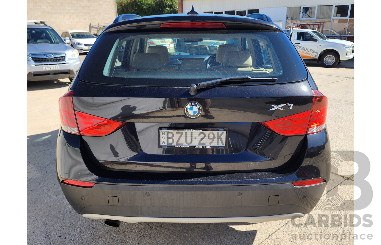 6/2011 Bmw X1 Sdrive 18i E84 MY11 4d Wagon Black 2.0L
