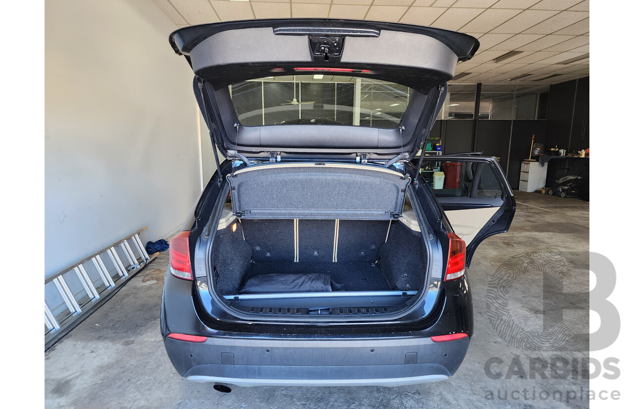 6/2011 Bmw X1 Sdrive 18i E84 MY11 4d Wagon Black 2.0L