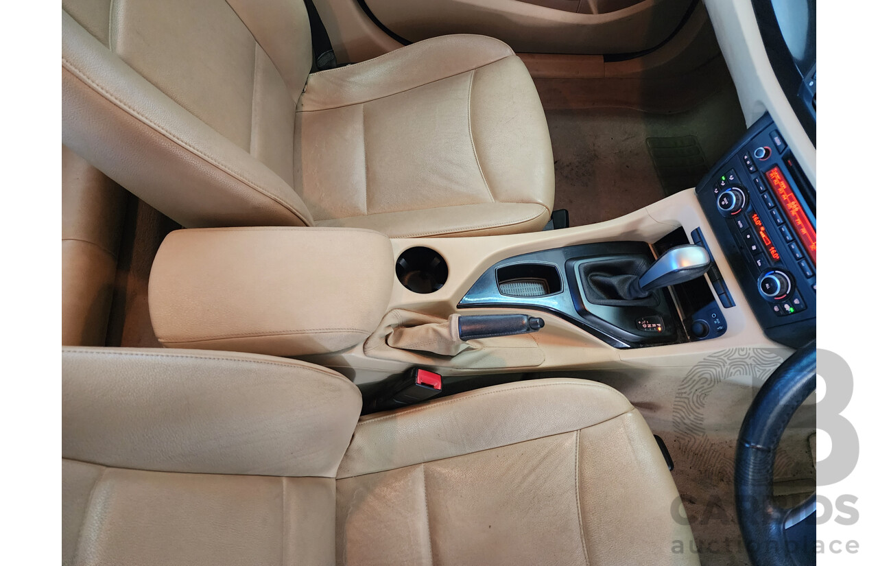 6/2011 Bmw X1 Sdrive 18i E84 MY11 4d Wagon Black 2.0L