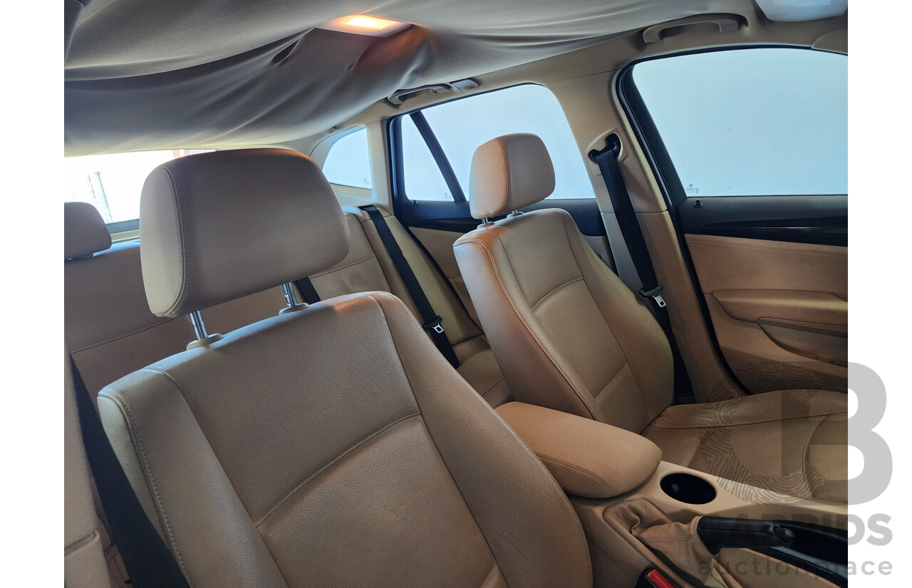 6/2011 Bmw X1 Sdrive 18i E84 MY11 4d Wagon Black 2.0L