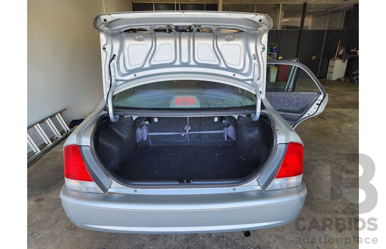 12/2000 Ford Laser LXi KN 4d Sedan Silver 1.6L