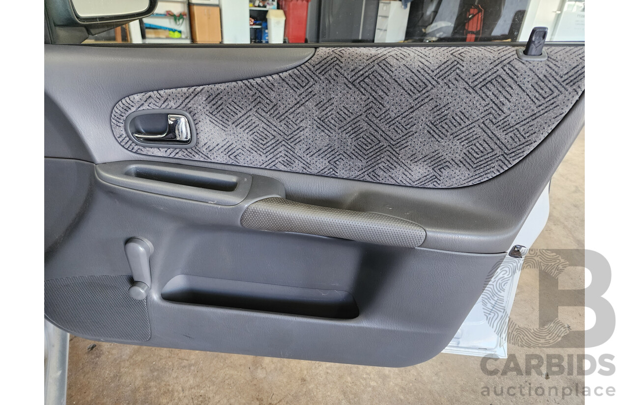 12/2000 Ford Laser LXi KN 4d Sedan Silver 1.6L