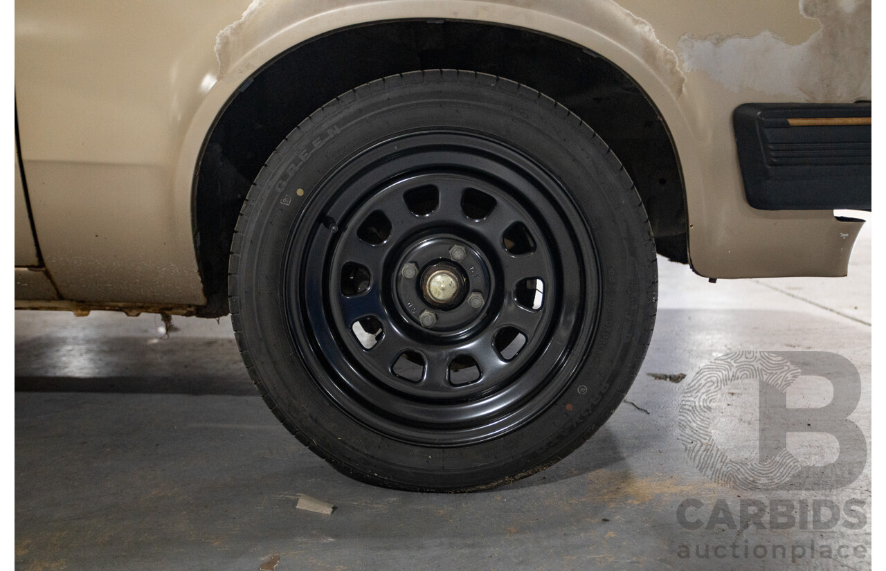 8/1982 Holden TF Gemini 4d Sedan Oyster Metallic 1.6L