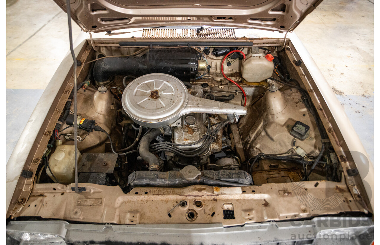8/1982 Holden TF Gemini 4d Sedan Oyster Metallic 1.6L