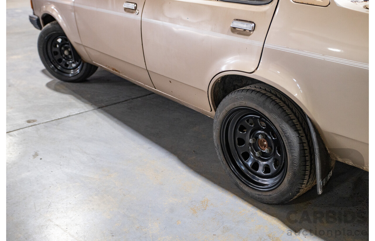 8/1982 Holden TF Gemini 4d Sedan Oyster Metallic 1.6L