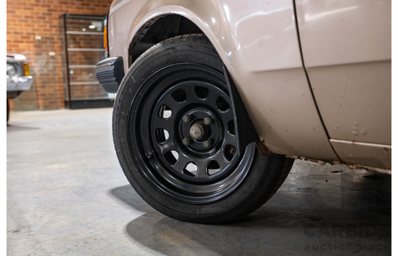 8/1982 Holden TF Gemini 4d Sedan Oyster Metallic 1.6L