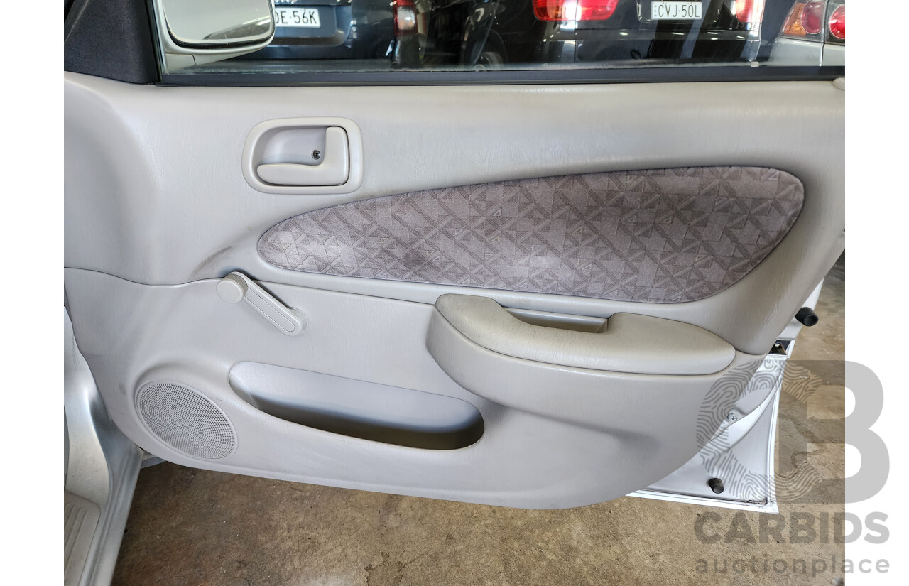 3/2000 Toyota Corolla Ascent SECA AE112R 5d Liftback Silver 1.8L