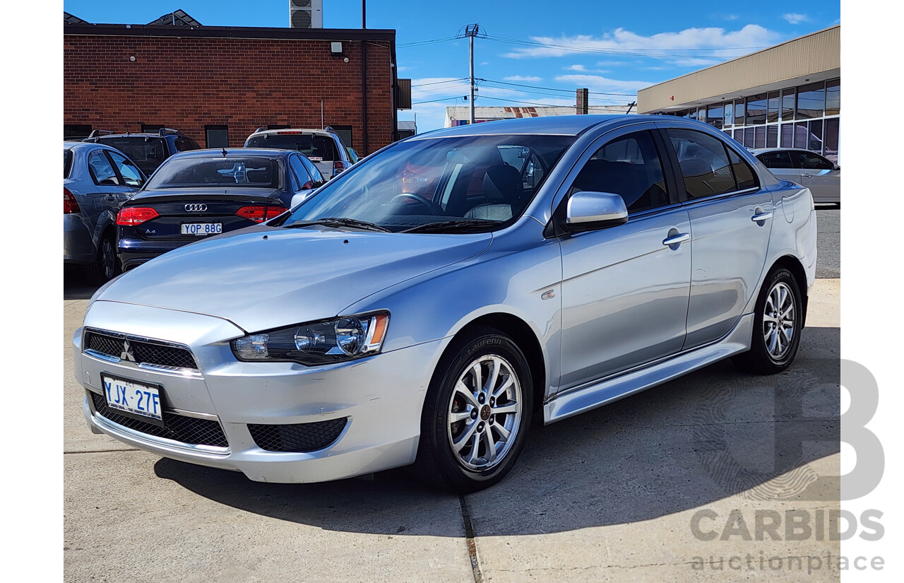 2/2013 Mitsubishi Lancer LX CJ MY13 4d Sedan Silver 2.0L
