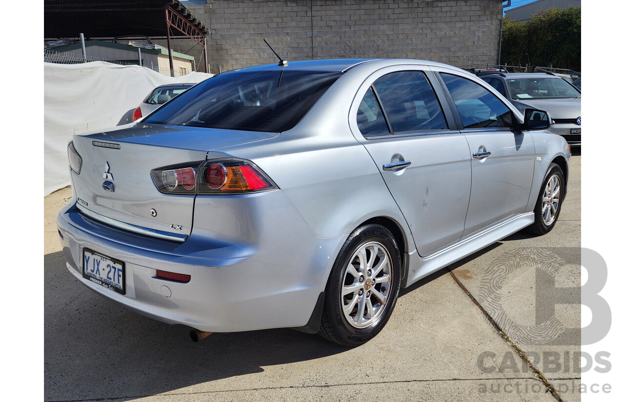 2/2013 Mitsubishi Lancer LX CJ MY13 4d Sedan Silver 2.0L