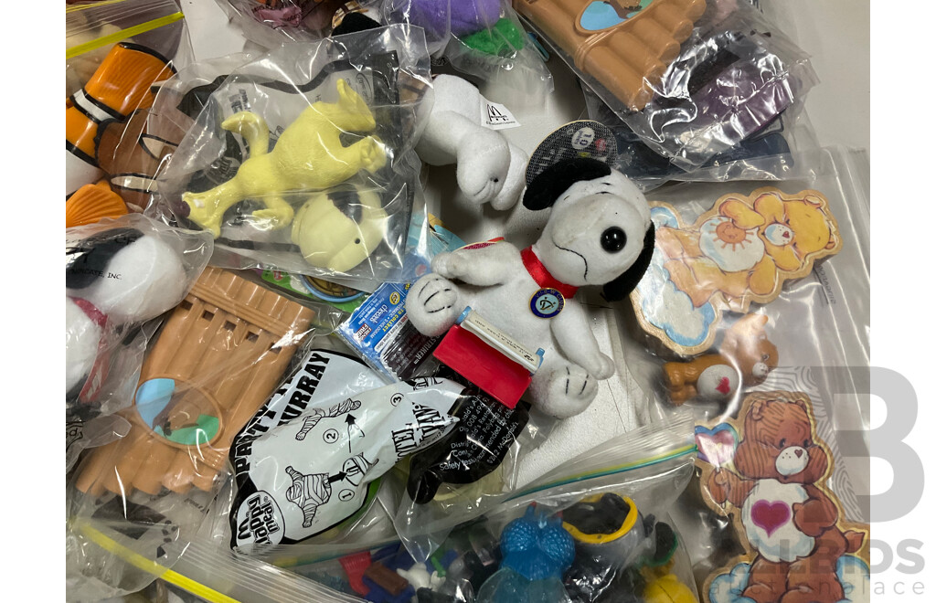Assortment of Fast Food Meal Toys in Original Packaging, Astro Boy, Simpsons Tazos, Lego Bionicle, Yowie Adventure Series Two, Care Bears, Display Figures and More