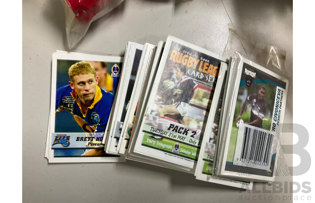 Assortment of Fast Food Meal Toys in Original Packaging, Astro Boy, Simpsons Tazos, Lego Bionicle, Yowie Adventure Series Two, Care Bears, Display Figures and More